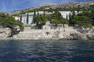 wild coast of croatian town dubrovnik from a boat