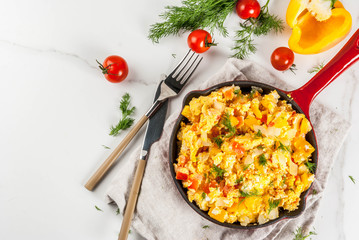 Mexican food recipes, Revoltillo de Huevos, Scrambled Eggs a la Dominicana, in portioned skillet,...