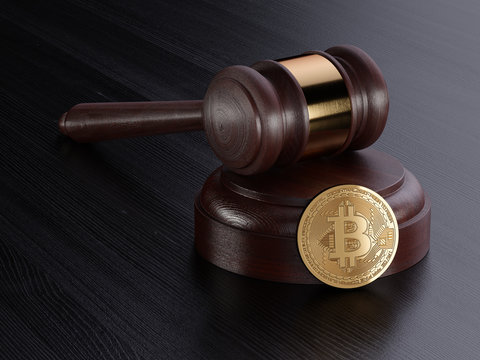 Gavel and bitcoin cryptocurrency golden coin