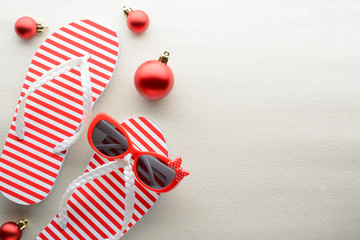Red and white flip flops and Christmas ornaments