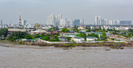 Naklejka premium Cityscape and river view of Ho Chi Minh City (Saigon). Vietnam, Southeast Asia