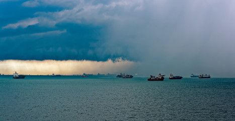 Tropical rain storm over Strait of Singapore