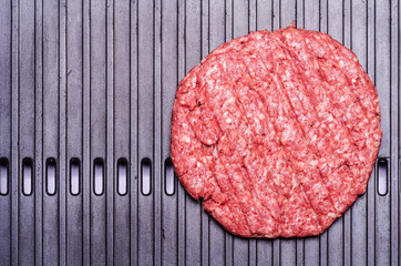 raw burger patty