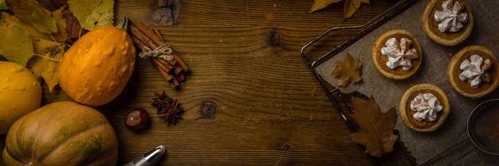 Thanksgiving concept - making mini pumpkin pies © anaumenko