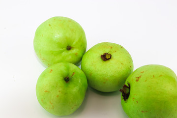 Green fresh sweet guava on white background