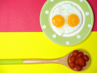 two eggs and tomatoes