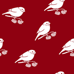 Seamless Pattern with a Bullfinch, Bullfinch Sitting on a Branch with Bunches of Rowan on a Red Background, Christmas Decorations, Vector Illustration