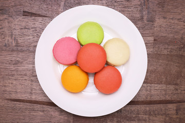 macaroons on white porcelain plate