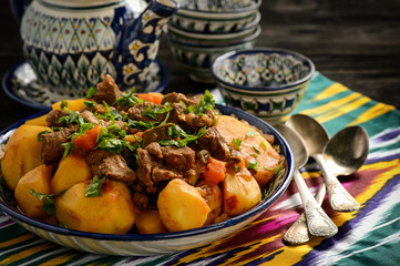 Beef stewed with vegetables, uzbek oriental style cuisine.