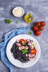 Fototapeta na wymiar Black spaghetti with seafood