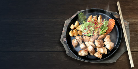 Authentic delicious Japanese food Fried Pork serve in the Hot Pan.
