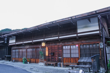 Kiso valley is the old  town or Japanese traditional wooden buildings for the travelers walking at historic old street  in Narai-juku , Nagano Prefecture, JAPAN.