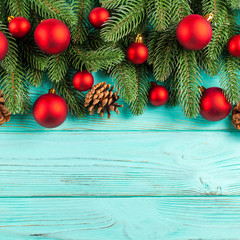 Christmas banner with green tree, red and white handmade felt decorations on white wooden textured background