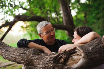 Senior couple walking together in a forest, close-up