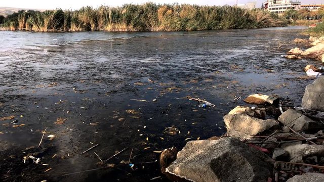 "Environmental problem plastic garbage pollution. Rubbish dump landfill ruins water environment su kirliği &ccedil;evre felaketi "