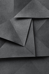 Obraz na płótnie Canvas Geometric shapes of paper, grey background