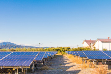 Solar power panels ,Photovoltaic modules for innovation green energy for life with blue sky background.