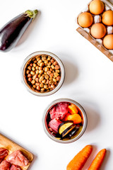 ingredients for pet food holistic top view on white background