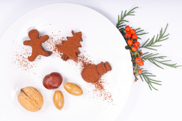 Holiday Food concept Homemade Chocolate truffle in Christmas and new year decor shape on white with copy space