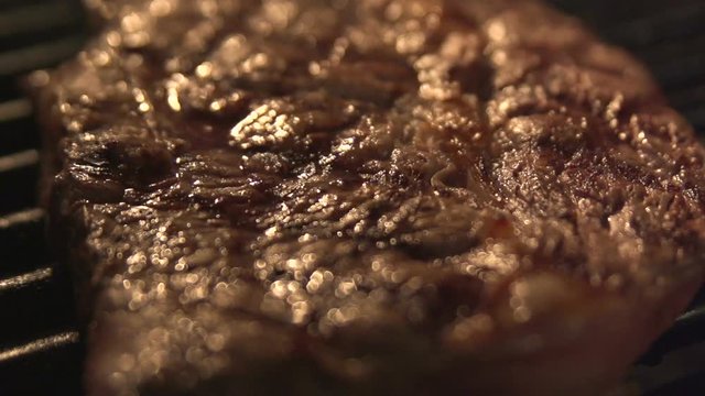 Aged Prime Rare Roast Grilling Tenderloin Fresh Beef Filet With Lines Slow Motion. Closeup Blur Macro Concept Of Cooked Healthy Juicy Very Satisfying Protein Supper At Home Picnic Party. Nobody Around