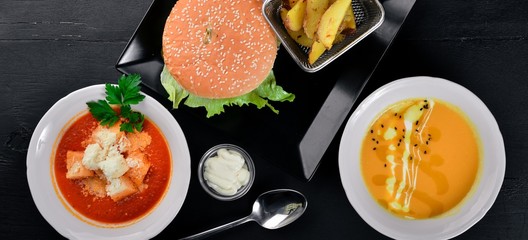 Pumpkin Soup. On a wooden surface. Top view. Free space for your text.