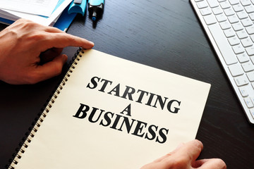 Book Starting a business on a desk.