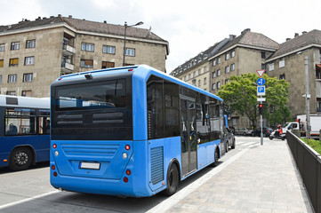 Blue buses on the streets of Budapest, Hungary