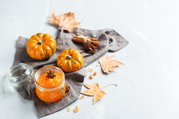 Obraz na płótnie Canvas Fall autumn pumpkin jam confiture with spices