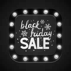 Square frame with shining light bulbs and black friday message