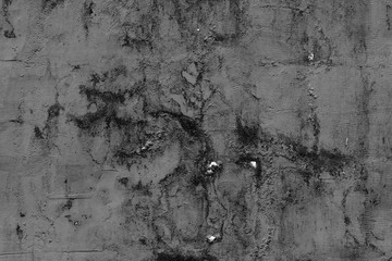 Wall fragment with scratches and cracks