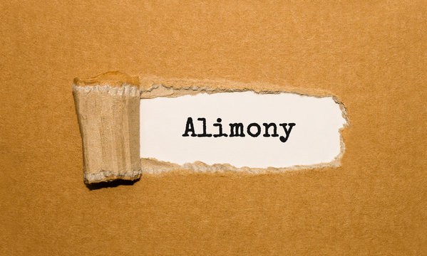 The text Alimony appearing behind torn brown paper