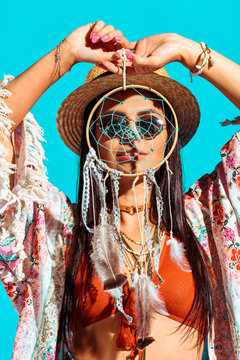 Bohemian Girl Holding Dreamcatcher