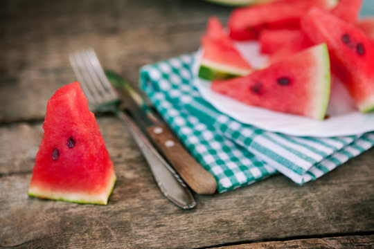 Watermelon slice with cutlery
