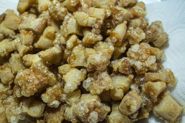 Cracking pork is crisped pork fat left in the pan after being fired for lard.