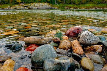 Fototapeta na wymiar The stones of the mountain rivers of Siberia