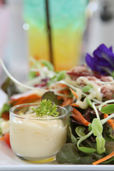 Green young sunflower sprouts salad with mayonnaise.