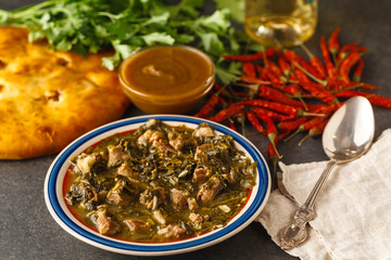 Chakapuli - Georgian stew.made from lamb chops or veal, onions, tarragon leaves, cherry plums or tkemali