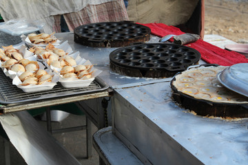 Thai dessert, Thai traditional dessert Kanom Krok, Thai pancake, coconut rice cake,Thai coconut pudding.