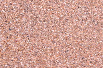 small stone texture as floor in orange color