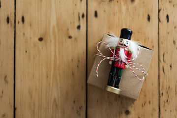 Christmas present box on a wooden background