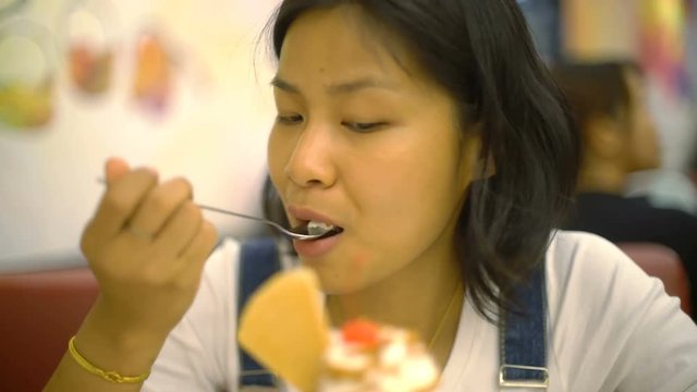 Young Asian Woman waiting for her order at cafe 4k UHD (3840x2160)
