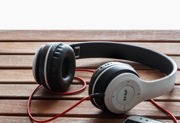 Headphones on wood  background