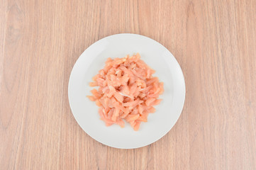 Raw chicken breast meat strips