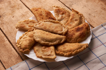 Traditional caucasian pies meat chebureks © Gecko Studio