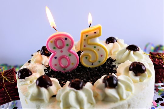 An image of a birthday cake with candle - 85