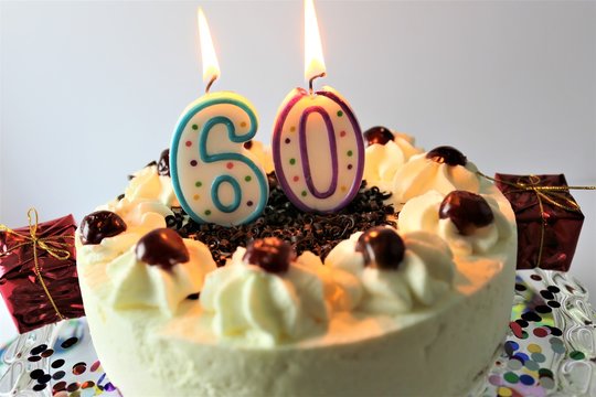 An image of a birthday cake with candle - 60