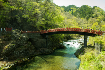 Naklejka na ściany i meble Japan traditional wooden arch bridge over river