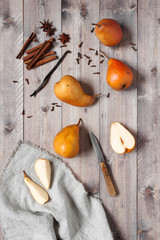 Pears and spices - ingredients fot sweet dessert on the wooden table
