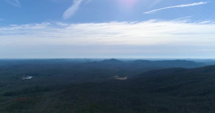 Wide open aerial drone footage of a mountain range landscape