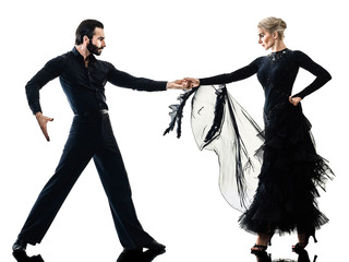 one caucasian man and woman couple ballroom tango salsa dancer dancing in studio silhouette...